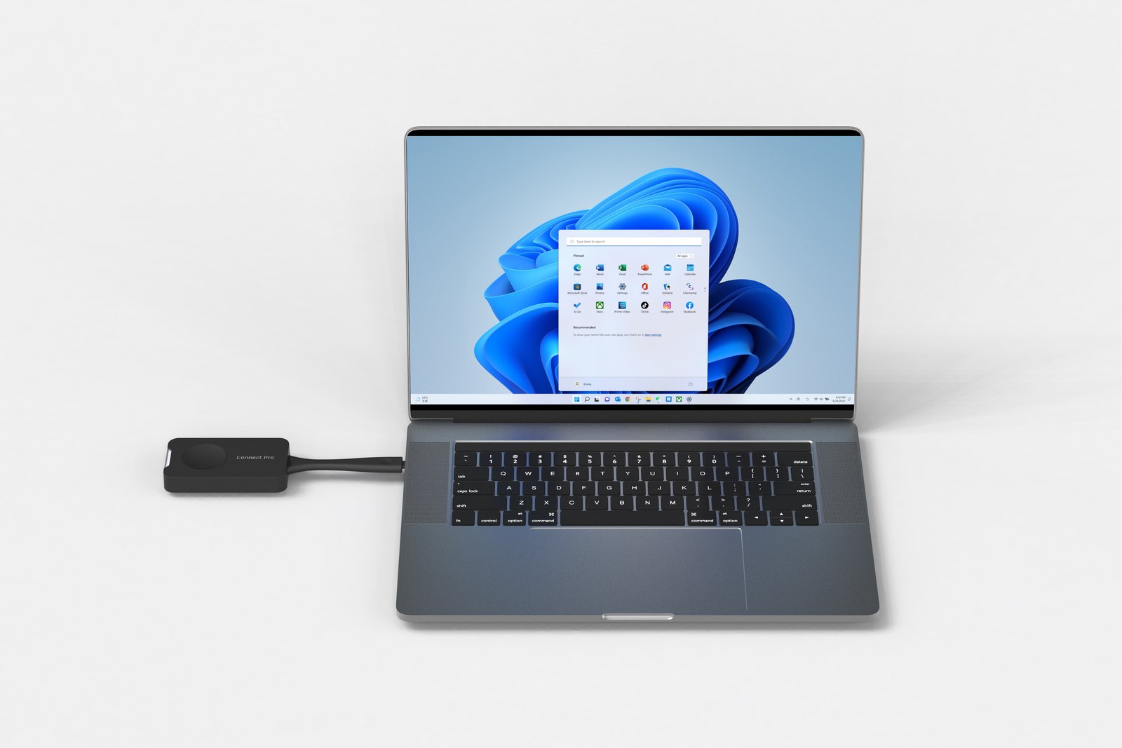 Przycisk Innex Connect Pro wpięty w laptop do monitora interaktywnego Innex CT86